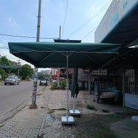 Ô kéo xanh ຮົ່ມຄັນໂຍກສີຟ້າ